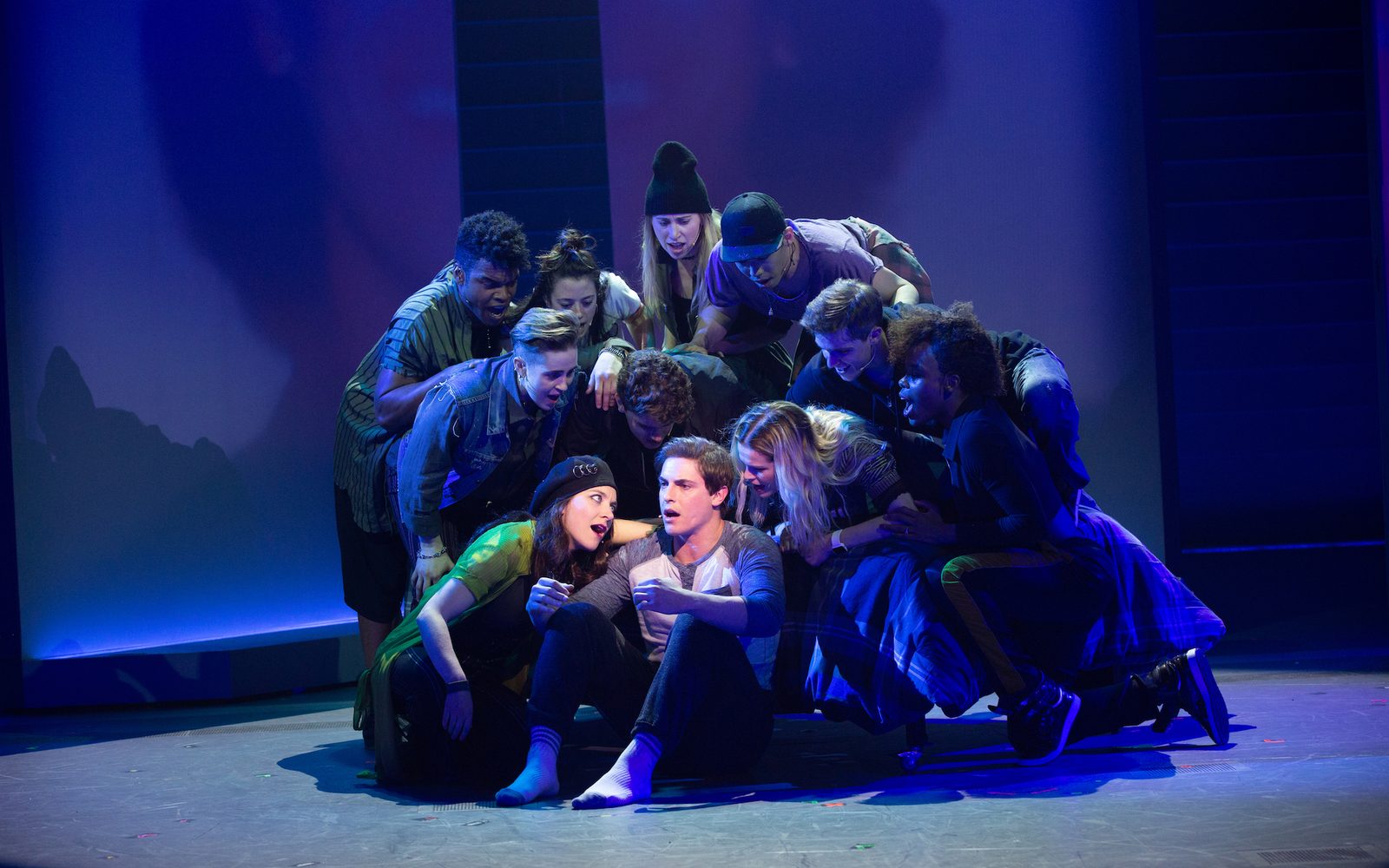 Derek Klena as Nick Healy and The Chorus of American Repertory Theater's Jagged Little Pill.