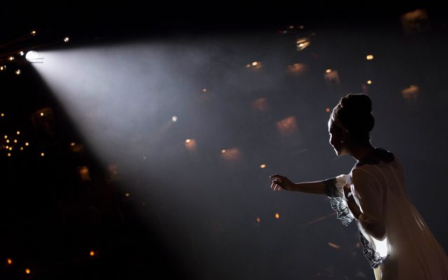 Denee Benton as Natasha, reaching her hand out in the dark