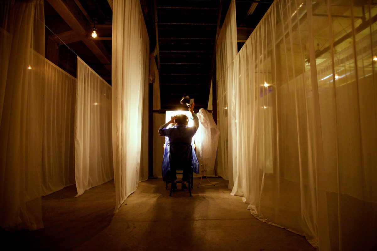 Audience member participating in The Garden