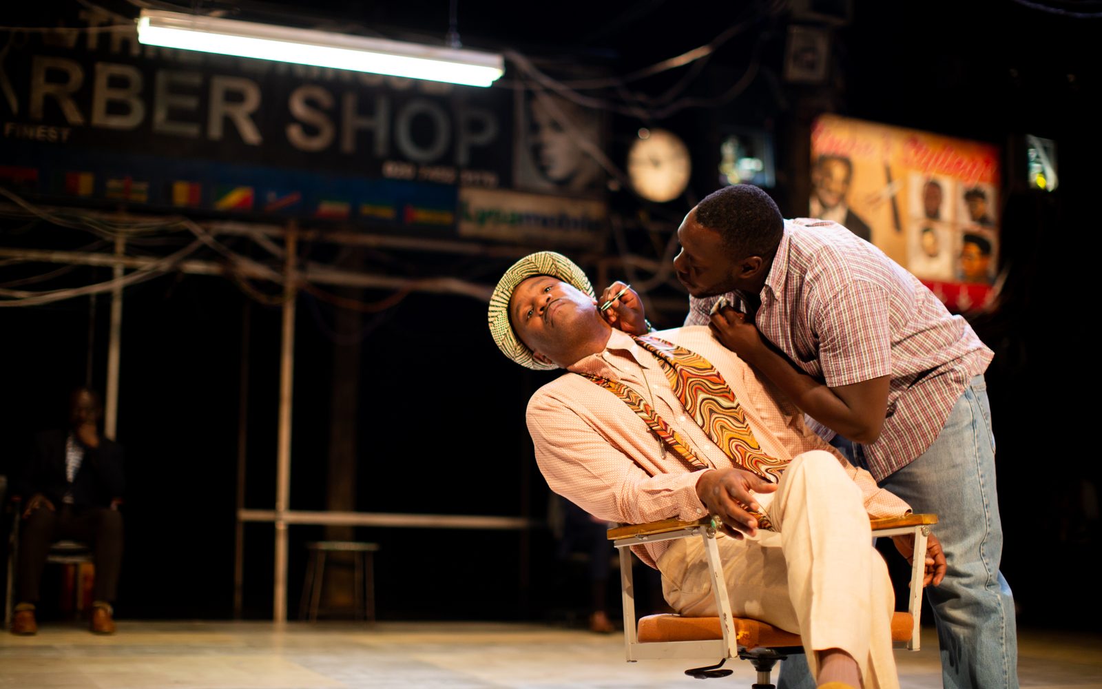 Patrice Naiambana and Ekow Quartey in Barber Shop Chronicles.