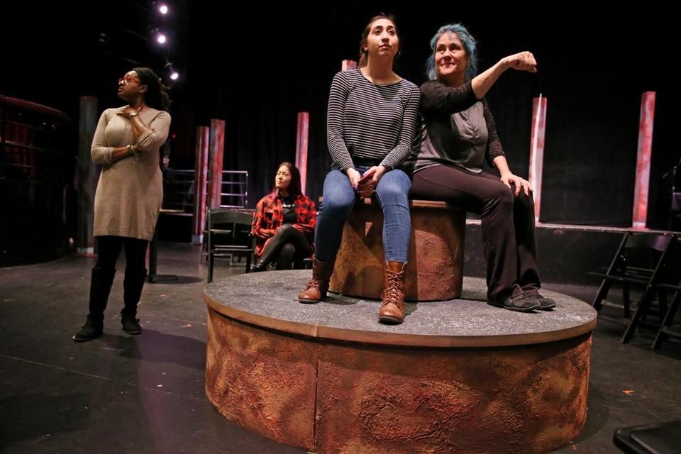 Krystal Hernandez (center right) and Johanna Carlisle-Zepeda (right) rehearse a scene from “Miss You Like Hell” for director Summer L. Williams (left) at OBERON in Cambridge.