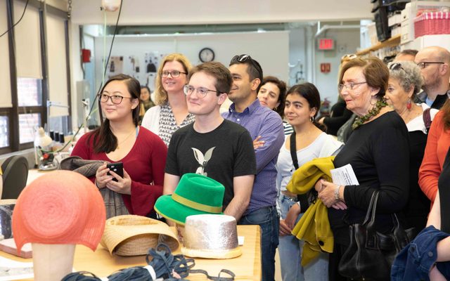 Attendees look at costume pieces at the A.R.T. Open House.