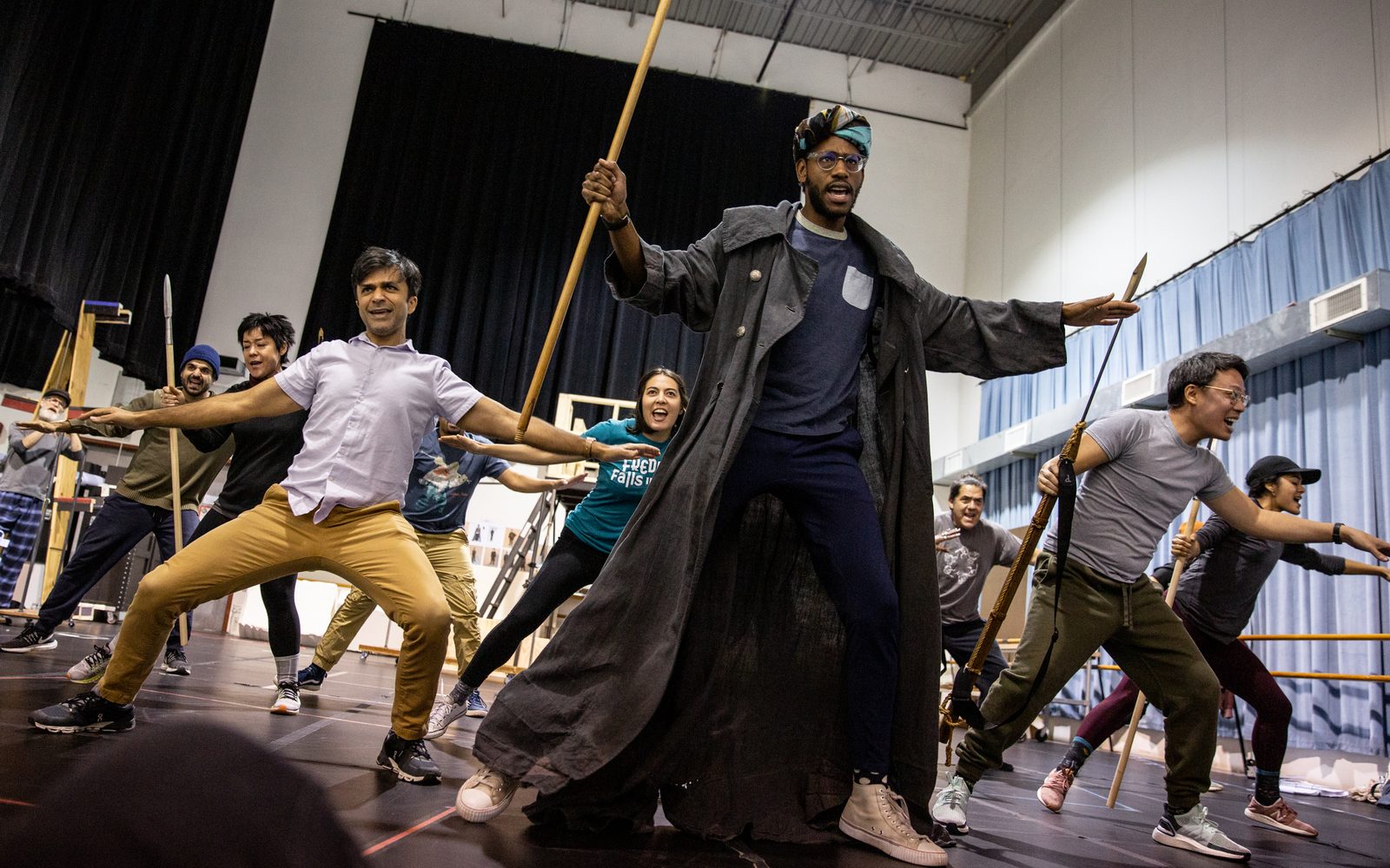 The company of Moby-Dick rehearses a number.