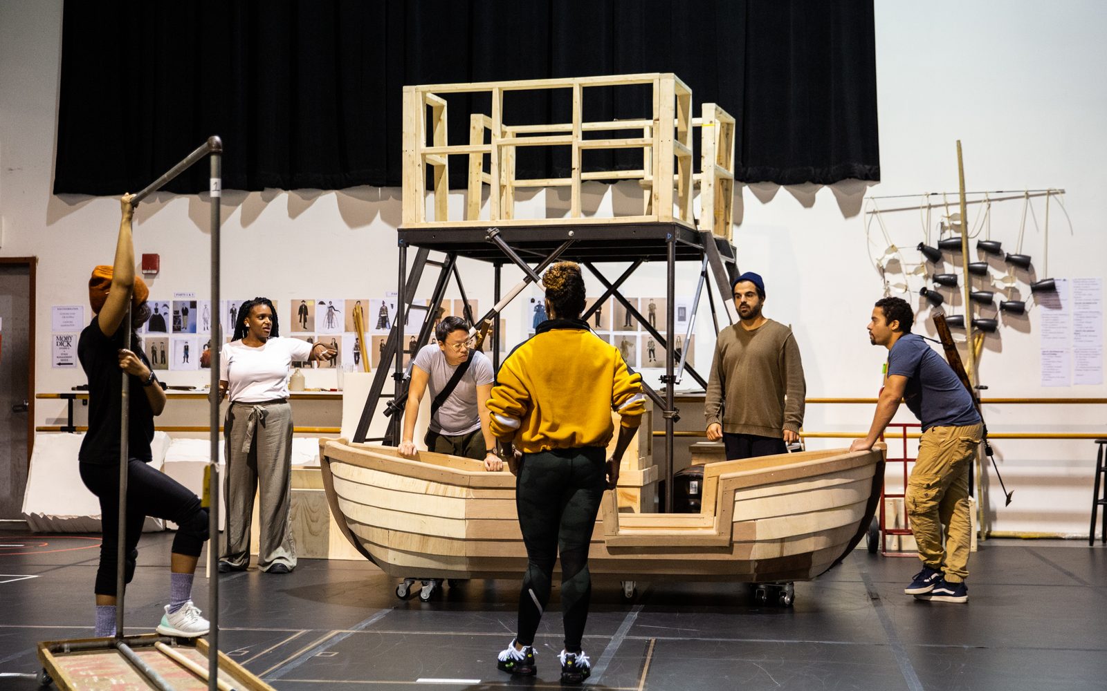 Choreographer Chanel DaSilva (center) works with actors on a scene in rehearsal for Moby-Dick.
