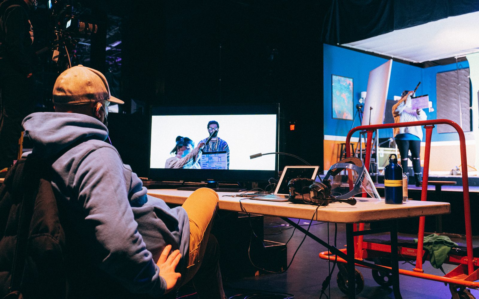 Original Stage Production Director and Co-Film Director Shawn LaCount prepares for capture of Kadahj Bennett (Verb) from one of the Director’s stations as Stage Manager Cesara Walters holds the clapboard.