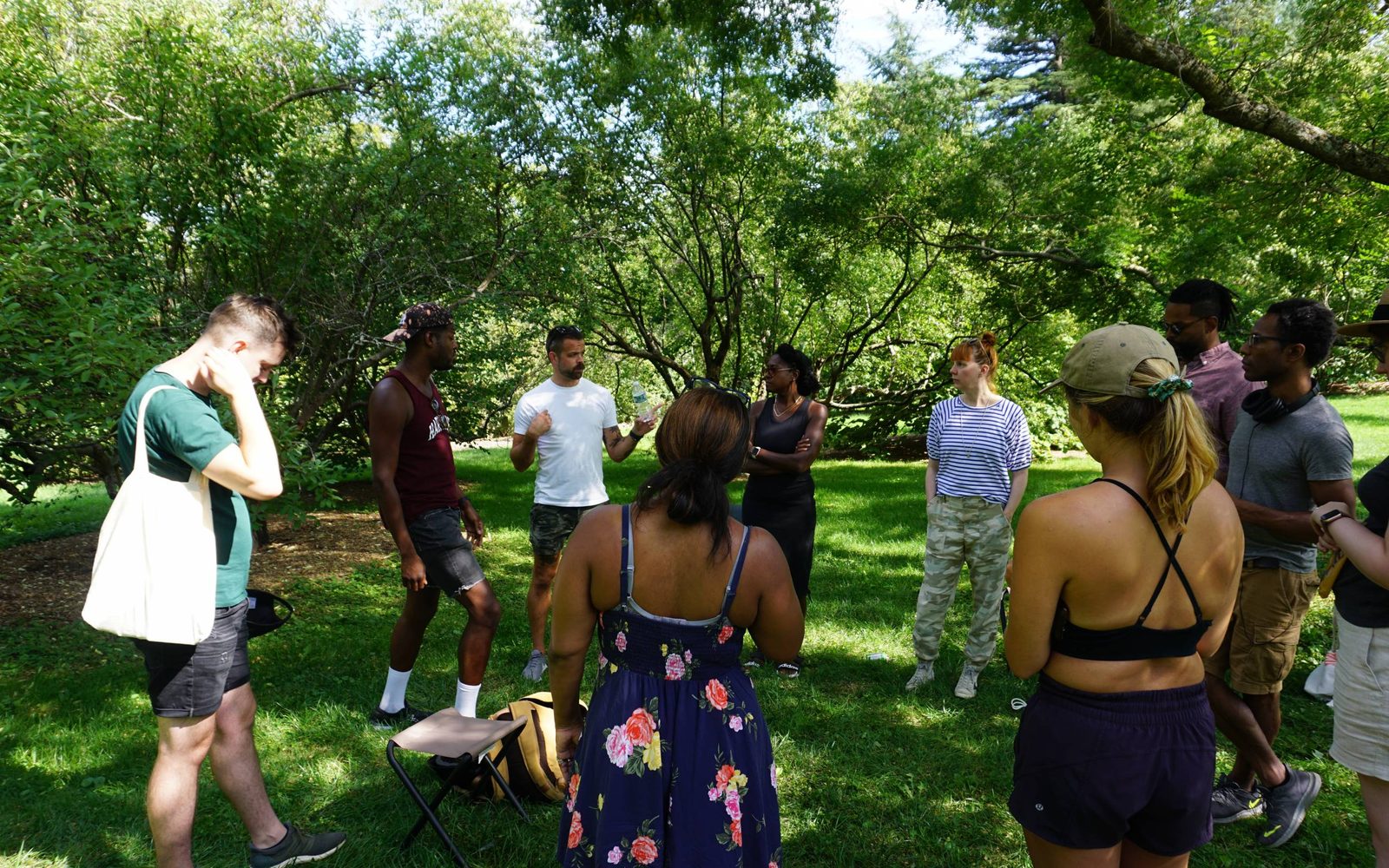 Members of The Arboretum Experience creative team and A.R.T. staff in the Arboretum.