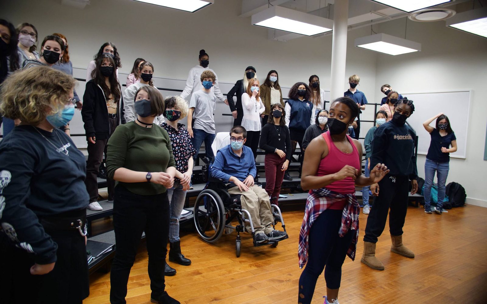 Chanel DaSilva stands in front of members of the Boston Children’s Chorus in rehearsal.