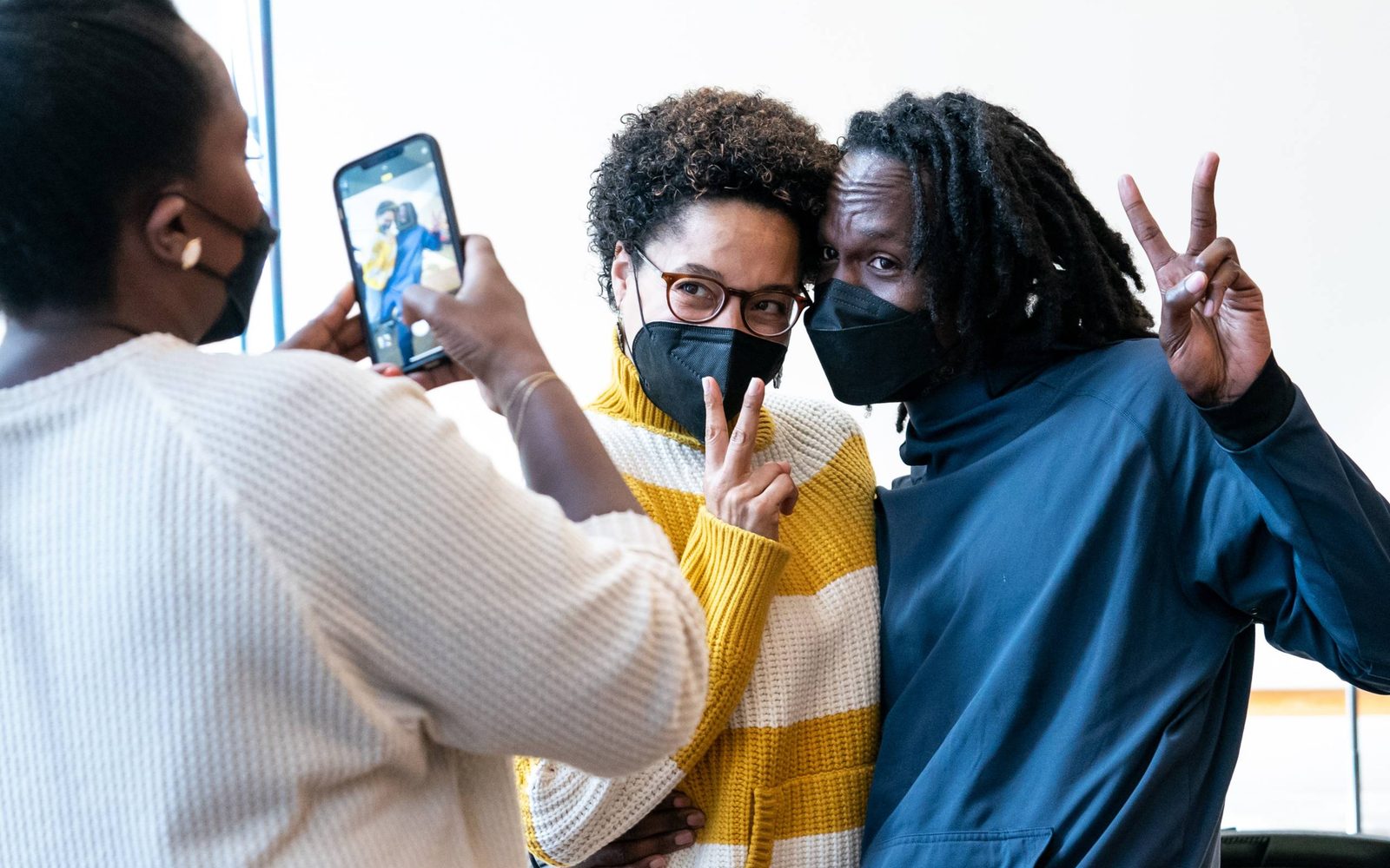 Crystal Lucas-Perry taking a photo of Jill Vallery and Director/Choreographer Jeffrey L. Paige.
